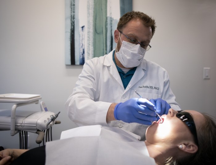 Cosmetic dentist in Phoenix treating a dental patient