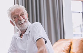 Man laughing with dentures