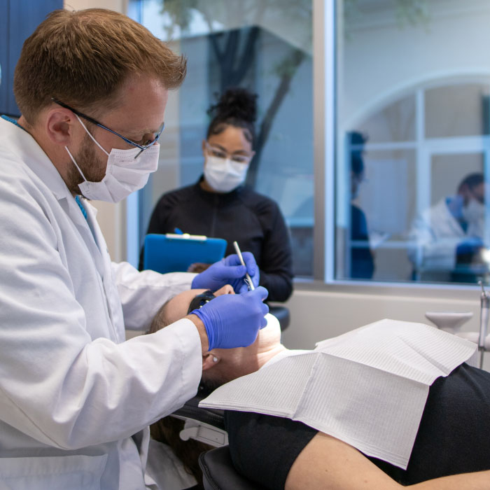 Doctor Rodda treating a dental patient