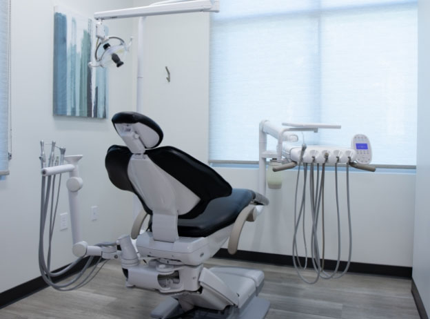 Sleek black dental exam chair at Complete Dental Care