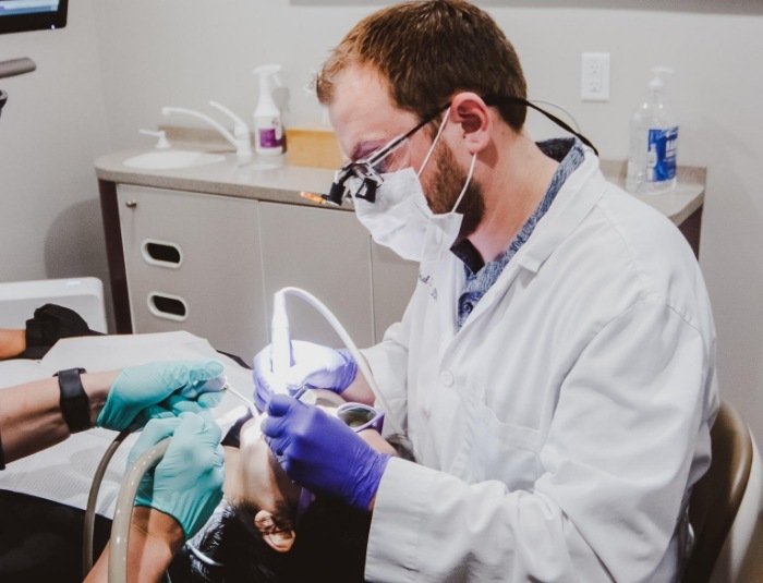 Doctor Rodda treating a dental patient